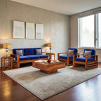 Homecrest Pilton 5-seater wooden sofa set with blue fabric cushions and a rich walnut-finished sheesham wood frame.