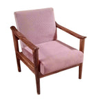 Homecrest single seater sofa with a solid Sheesham wood frame and quilted pink velvet upholstery