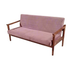 Homecrest contemporary sofa with a solid sheesham wood frame and pink quilted velvet upholstery in a bright room.