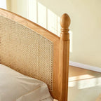 Homecrest mid-century style bed frame featuring a natural acacia wood headboard with intricate rattan cane detailing.
