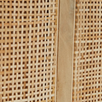 Homecrest rattan bed headboard featuring natural woven cane texture and a solid mango wood frame detail