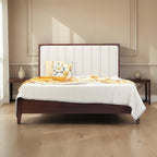 Homecrest Rushden teakwood bed featuring a modern paneled upholstered headboard in marble fabric and dark wood frame.