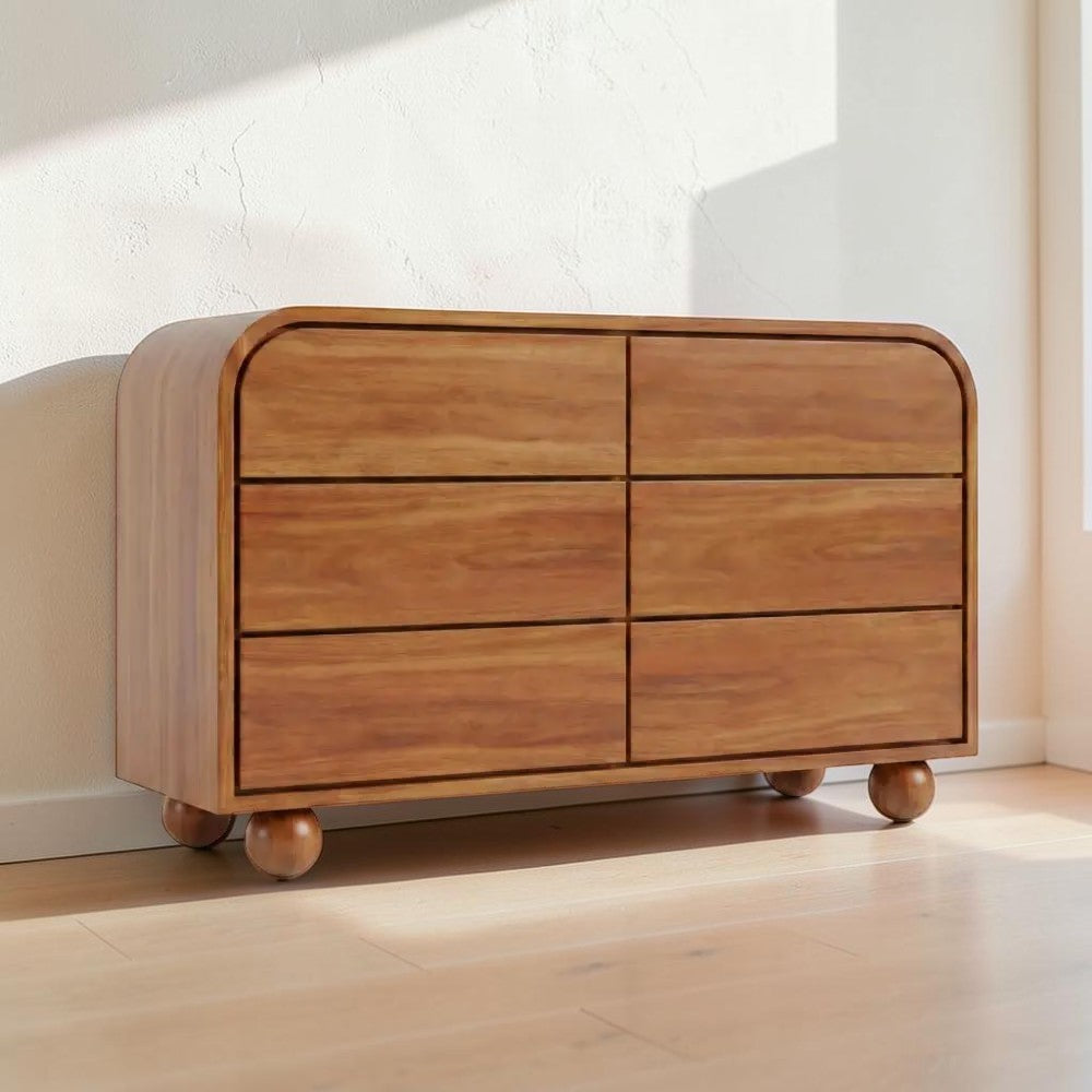 Homecrest Roswell 6-drawer dresser in warm brown acacia wood with rounded edges and spherical feet