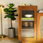 Homecrest Selby sideboard in teak wood featuring a fluted glass cabinet door and handwoven wicker cupboard detail.