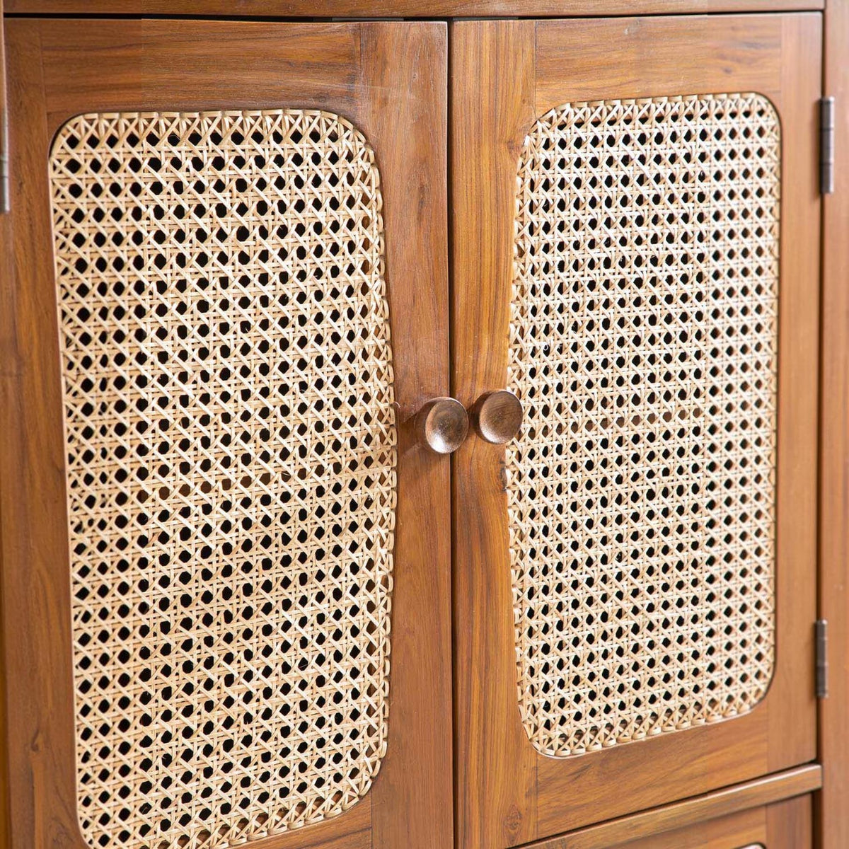 Homecrest Selby sideboard featuring handwoven wicker cabinet doors set in a warm reclaimed teak wood frame
