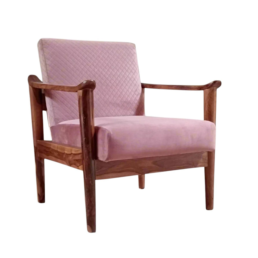 Homecrest single seater sofa with a solid Sheesham wood frame and pink velvet upholstery featuring quilted backrest