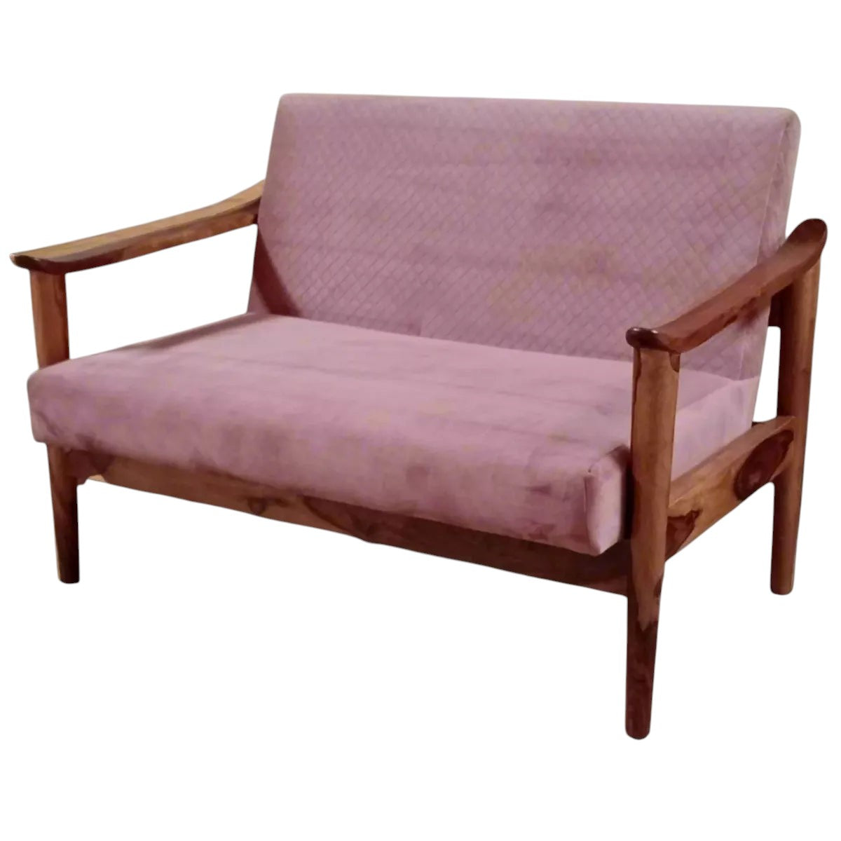 Homecrest two-seater sofa featuring a solid Sheesham wood frame and pink quilted velvet upholstery.