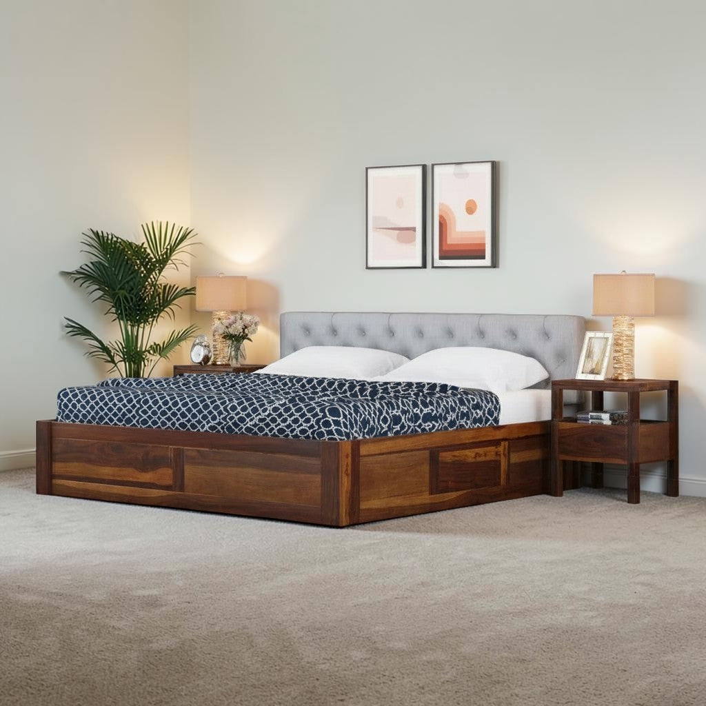 Homecrest Farleigh solid Sheesham wood platform bed with a grey upholstered tufted headboard in a bedroom setting.
