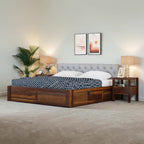 Homecrest Farleigh solid Sheesham wood platform bed with a grey upholstered tufted headboard in a bedroom setting.