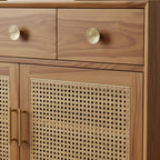Homecrest Vellore solid Sheesham wood chest of drawers with honey finish, rattan cabinet doors, and gold hardware.