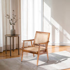 Homecrest Semley armchair featuring a reclaimed teak wood frame and hand-woven rattan wicker seat in a natural finish.