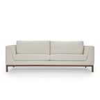 Homecrest Solace deep-seat lounge sofa in ivory fabric with contrast piping on a handcrafted teakwood base frame.