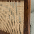 Homecrest 2-seater sofa featuring a rich walnut solid wood frame with detailed natural cane side paneling