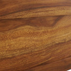 Close-up of Homecrest Norbury solid wood platform bed showing natural grain patterns and warm brown wood finish.