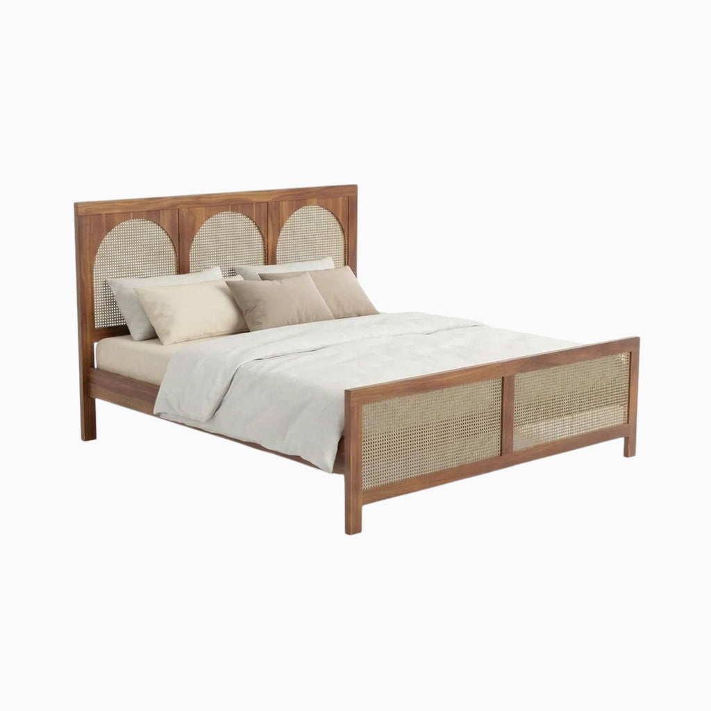 Homecrest solid wood bed frame featuring a triple arch rattan headboard and matching cane footboard in natural finish.