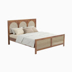 Homecrest solid wood bed frame featuring a triple arch rattan headboard and matching cane footboard in natural finish.