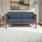 Homecrest contemporary solid wood 2-seater sofa with dark grey fabric cushions and elegant vertical slatted armrests