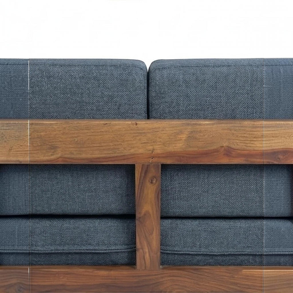 Homecrest contemporary sofa featuring a rich walnut solid wood frame with vertical slatted arms and blue fabric cushions