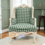 Homecrest Stanmer armchair featuring a green and white checkered fabric upholstery on a carved solid wood frame.