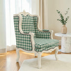 Homecrest Stanmer handcrafted armchair with a green and white gingham fabric and a carved white solid wood frame.