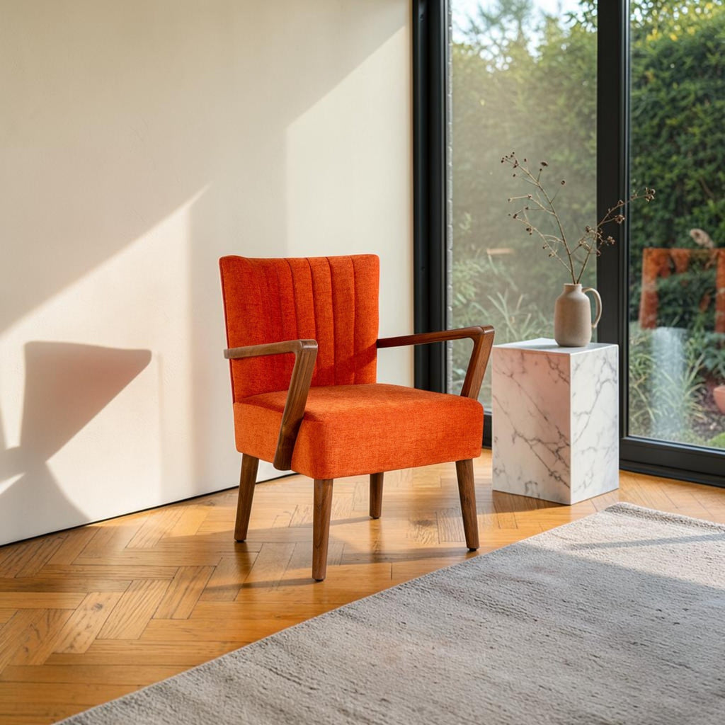 Homecrest Pelham armchair in vibrant orange fabric with a mid-century teak wood frame and fluted backrest detail.