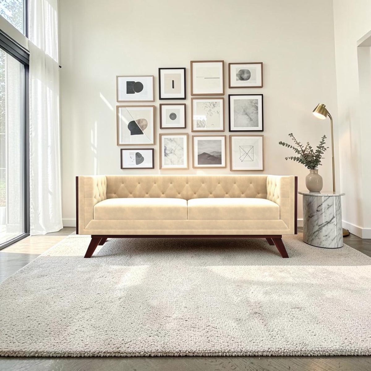 Homecrest Sturton Chesterfield sofa in beige velvet with tufted backrest and dark wooden legs in a bright living room.