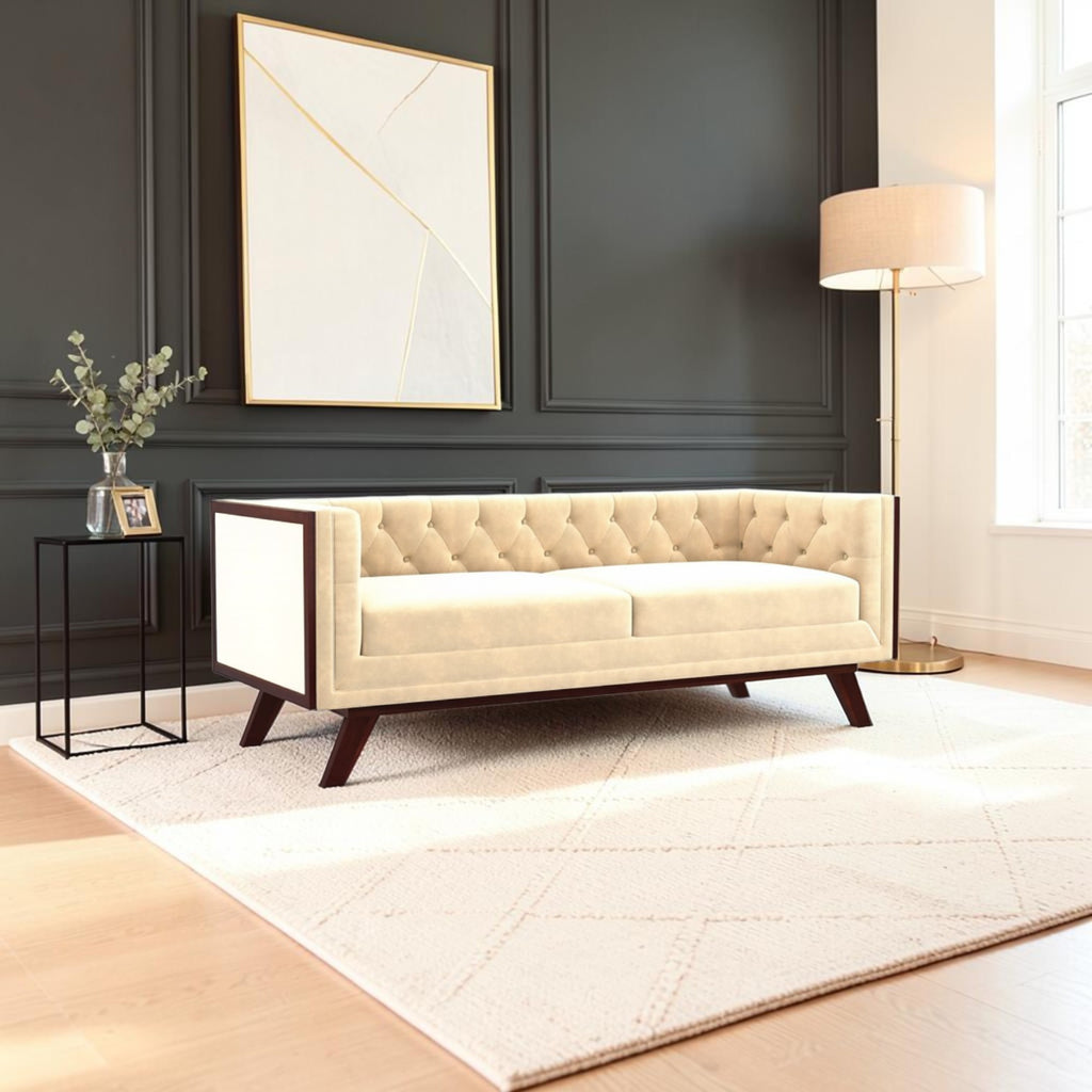Homecrest Sturton velvet Chesterfield sofa in a light beige hue with tufted backrest and dark wood frame