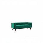 Homecrest Sturton emerald green velvet Chesterfield sofa with tufted backrest and dark wooden legs