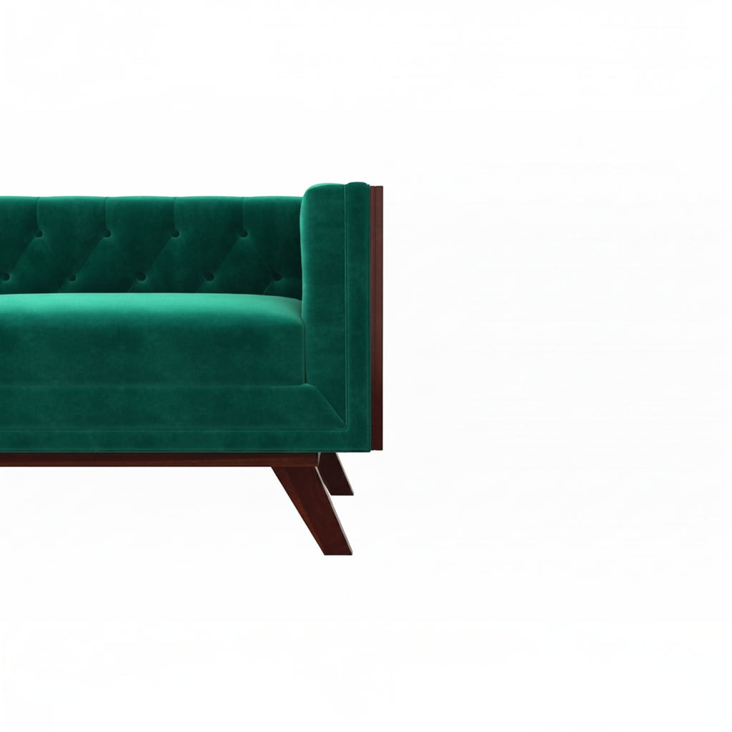Homecrest Sturton Chesterfield sofa in emerald green velvet with tufted detailing and dark wooden legs