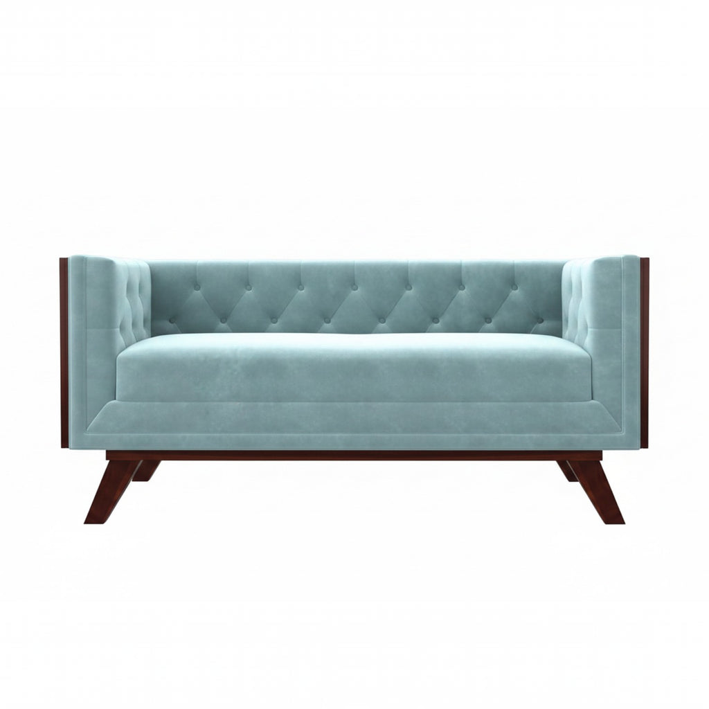 Homecrest Sturton Chesterfield sofa in light blue velvet with button tufting and dark wooden legs