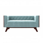 Homecrest Sturton Chesterfield sofa in light blue velvet with button tufting and dark wooden legs