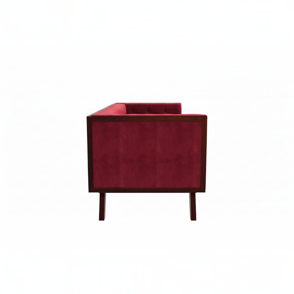 Homecrest Sturton Chesterfield sofa in pomegranate red velvet with a rectangular frame and dark wooden legs, side view.