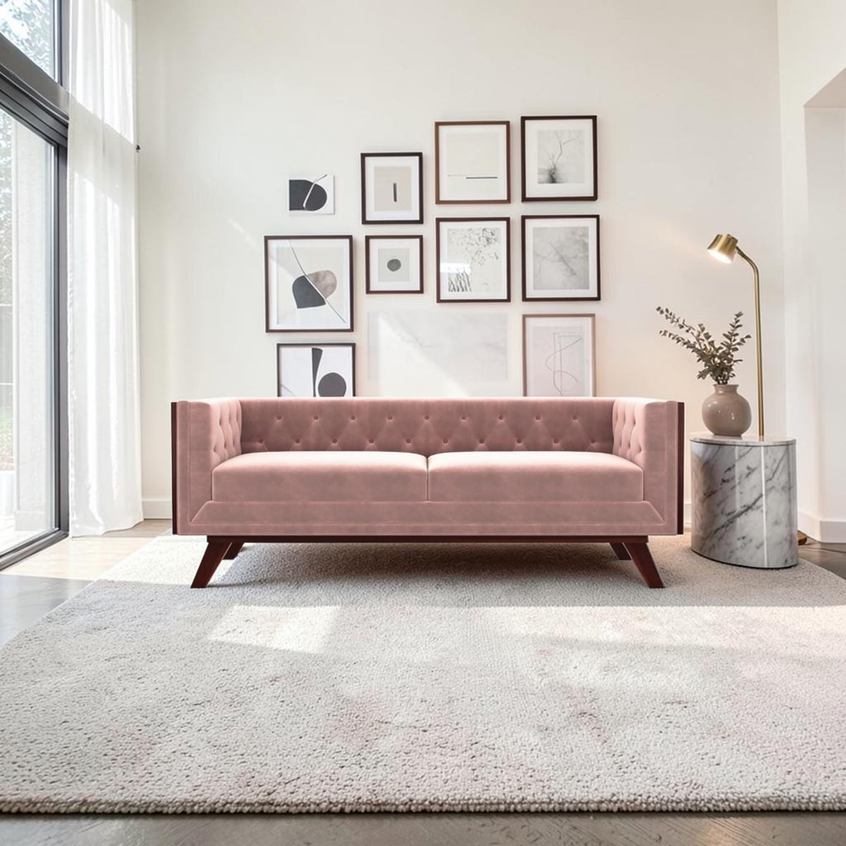 Homecrest Sturton velvet Chesterfield sofa in rose dust with tufted backrest and dark wooden legs in a bright room