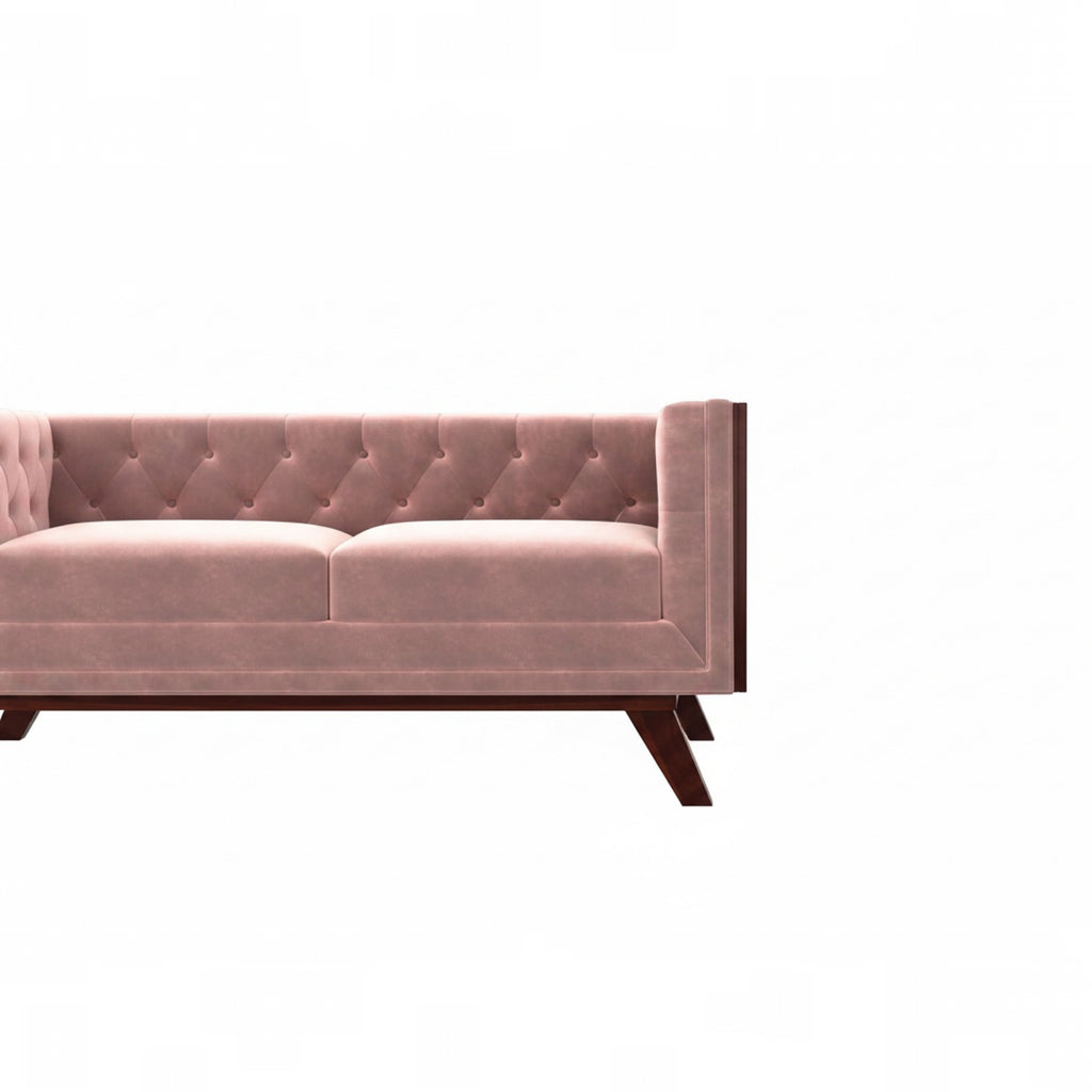 Homecrest Sturton velvet Chesterfield sofa in rose dust with button tufting and dark wooden legs