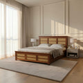 Homecrest Studley solid Sheesham wood bed with natural cane detailing and integrated box storage in a bright bedroom.