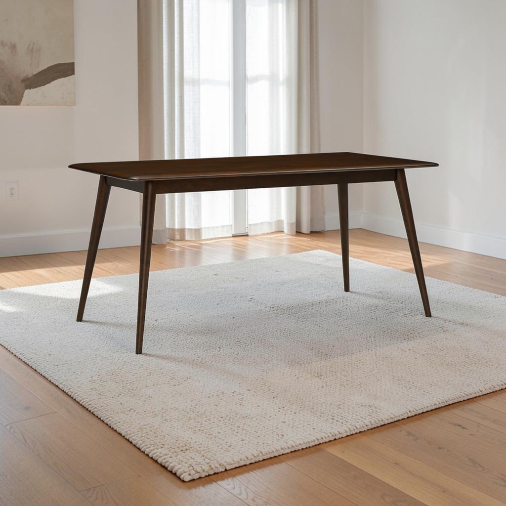 Homecrest Tarn rectangular dining table in a dark walnut finish, crafted from solid sheesham wood on a textured rug.
