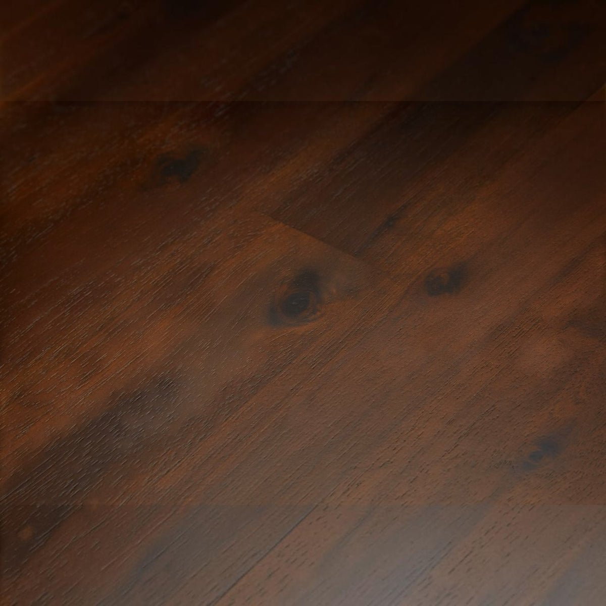 Homecrest Tarn rectangular dining table surface in a rich walnut finish showing natural sheesham wood grain patterns