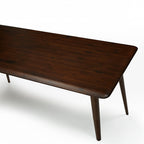 Homecrest Tarn rectangular dining table in a dark walnut finish made from solid sheesham wood with tapered legs.