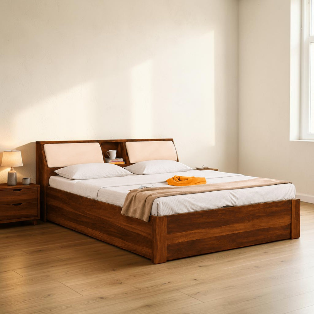 Homecrest Tetbury solid Sheesham wood bed with storage headboard, open shelving, and cushioned backrests in dark teak.