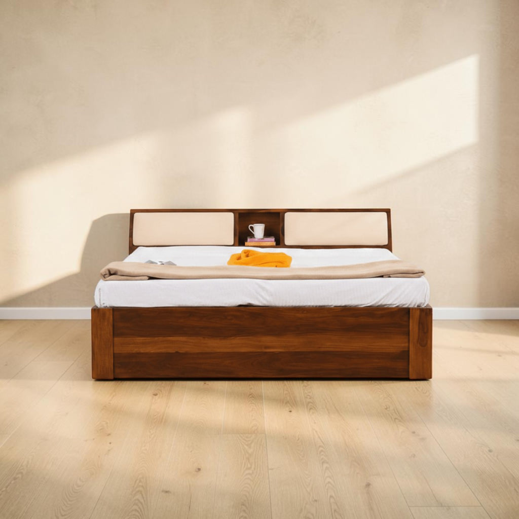 Homecrest Tetbury solid Sheesham wood bed featuring a storage headboard with cushioned backrests in a bedroom setting.