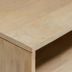 Homecrest Thayer media stand featuring a smooth natural finish mango wood surface and rattan detailing