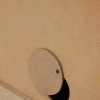 Homecrest Thayer media stand back panel featuring a circular cable management cutout with a wooden cover