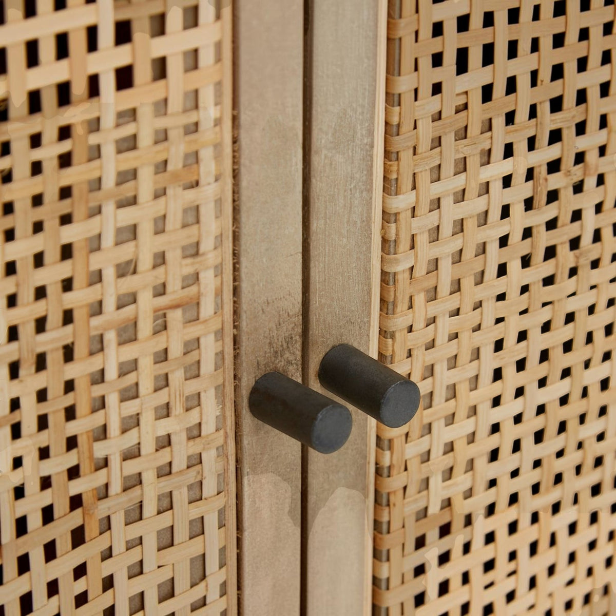 Homecrest Thayer media stand featuring natural rattan weave panels and minimalist black cylindrical door handles.