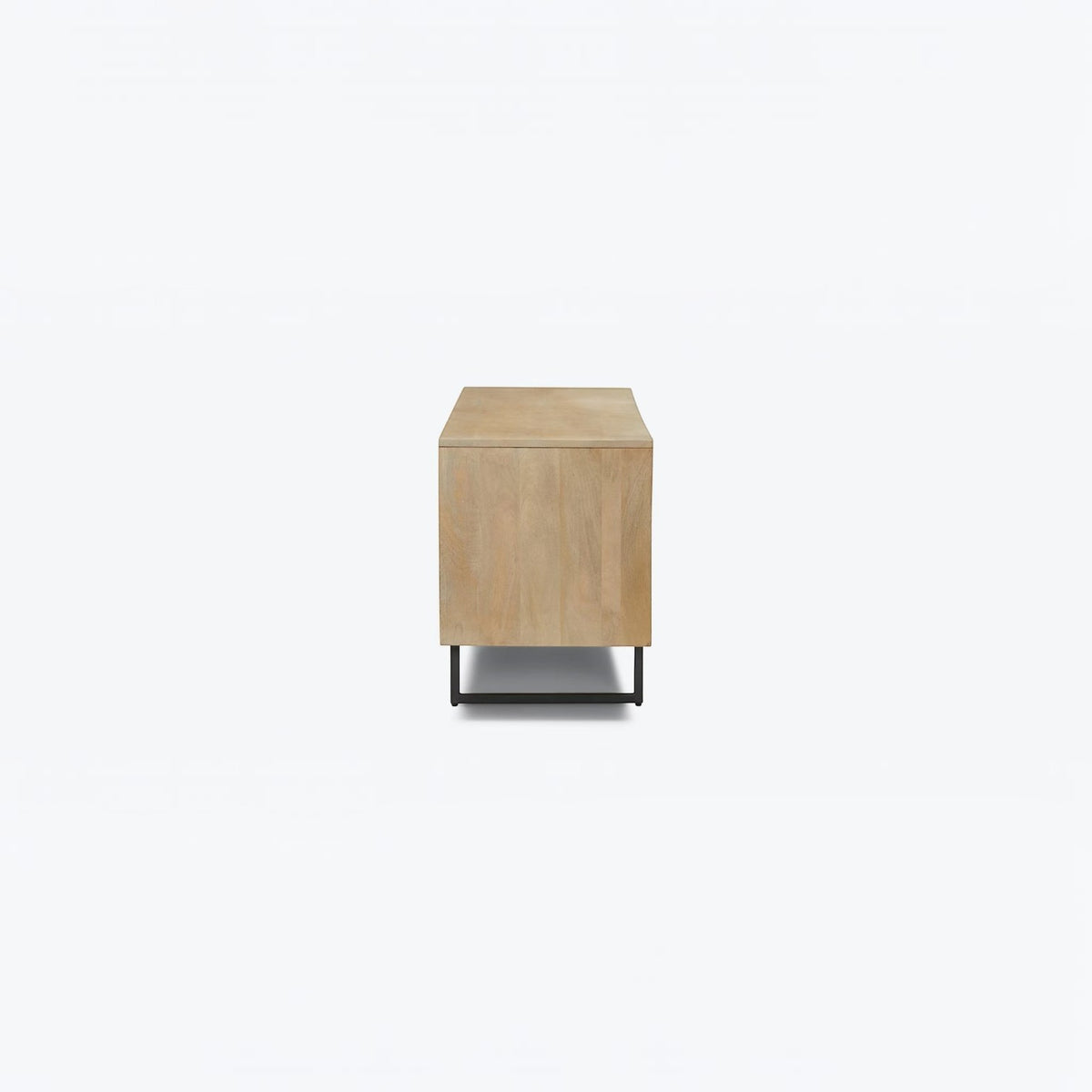 Homecrest Thayer media stand in natural mango wood with rattan detailing and black metal base, side view.