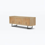 Homecrest Thayer media stand in natural mango wood with rattan panels and black metal legs