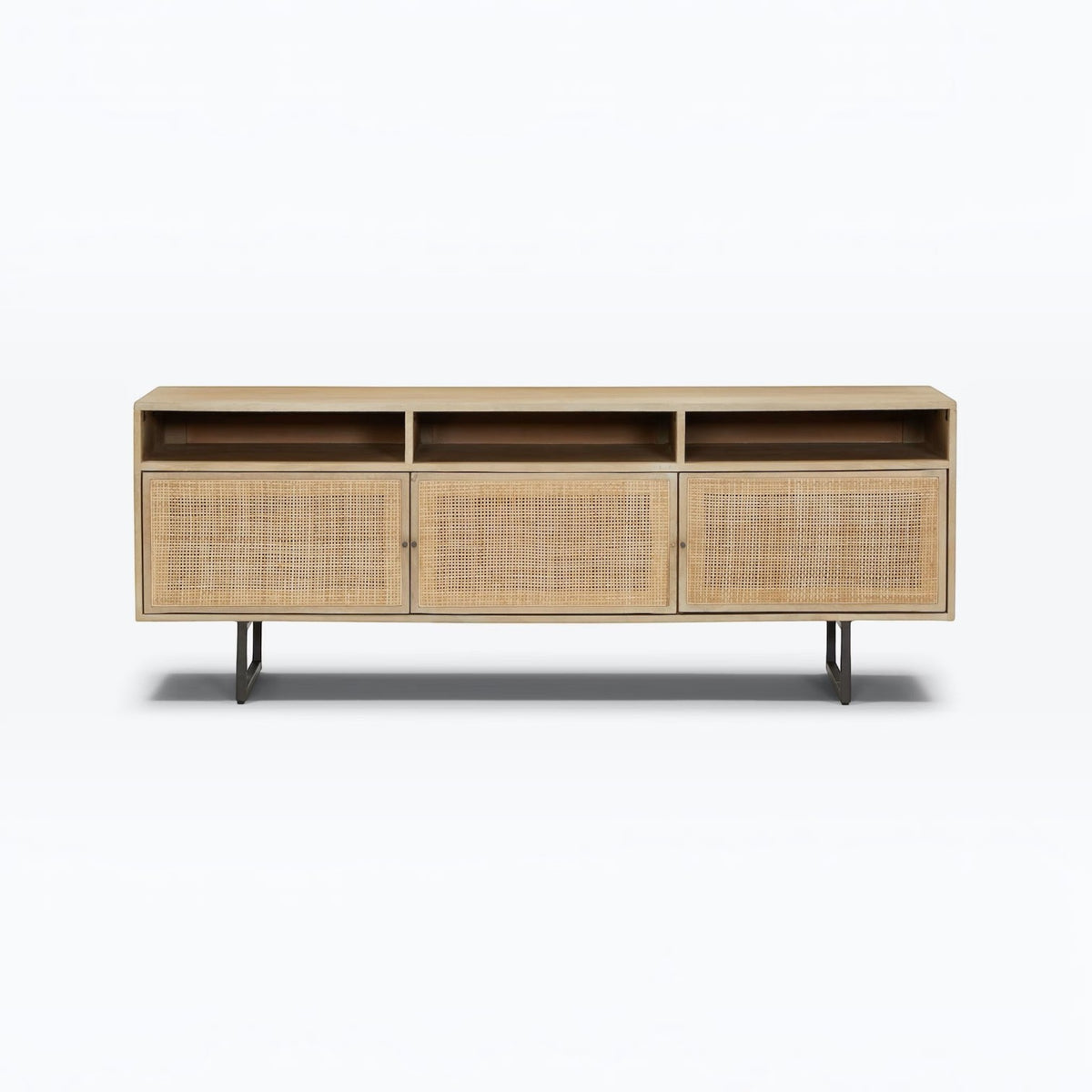 Homecrest Thayer media stand in natural mango wood with rattan cabinet doors and open shelving on metal legs.