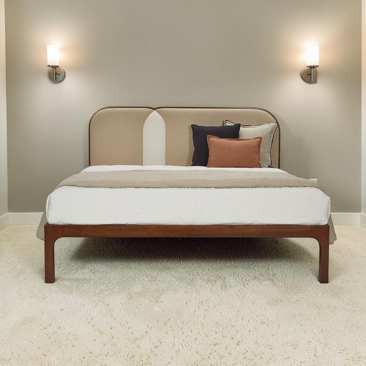 Homecrest Ufton Art Deco teakwood bed featuring a sand-colored boucle upholstered headboard in a modern bedroom.