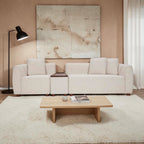 Homecrest Vero modular sofa in bone fabric with teakwood tray, arranged in a straight configuration in a living room.