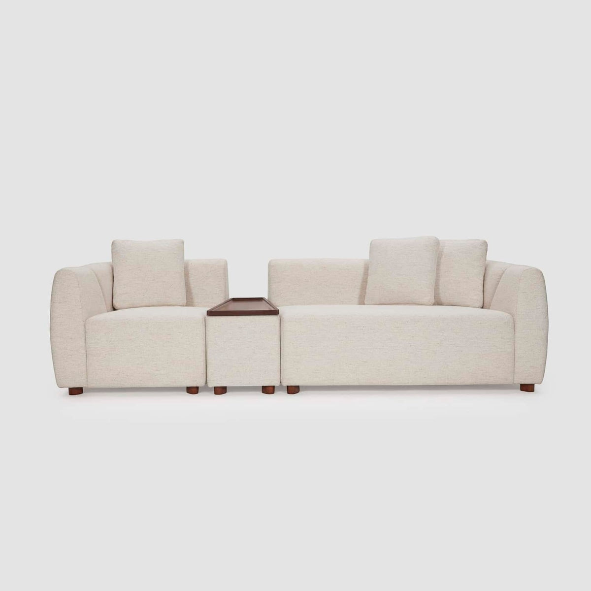 Homecrest Vero modular sofa in bone fabric with teakwood tray and legs, shown in a straight configuration.