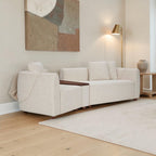 Homecrest Vero modular sofa in bone upholstery with teakwood tray and legs, arranged in a straight configuration.
